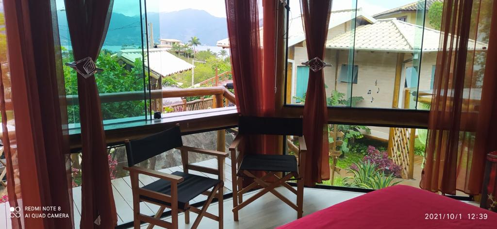 Bangalô Cinema com vista para o mar